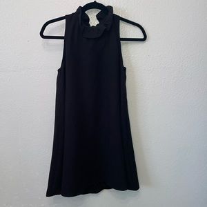 Perfect little black dress   Tie back bow.  Zip up back.  Aline.